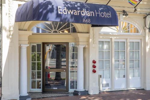 an entrance to a hotel with a blue awning at Edwardian Hotel in San Francisco